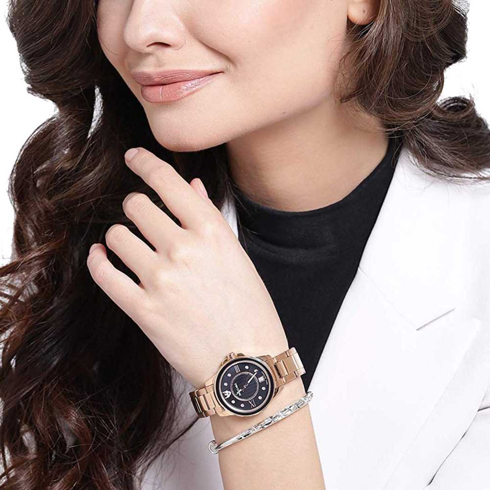 Metal round hot sale women's watch